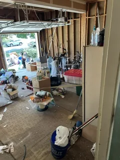 Cluttered garage before an estate cleanout