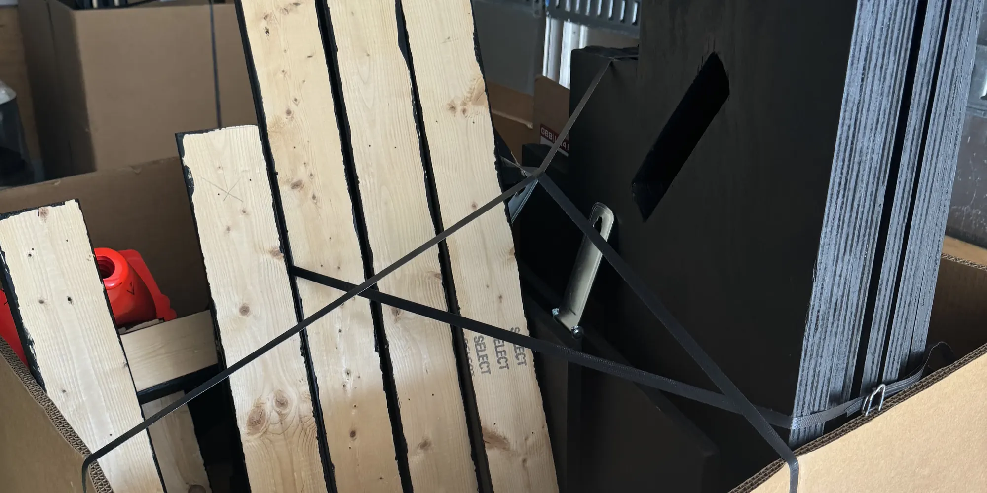 Event staging panels crated and strapped for transport